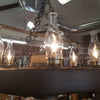 The Small Faux Wagon Wheel Chandelier with uplights - Stock Item!